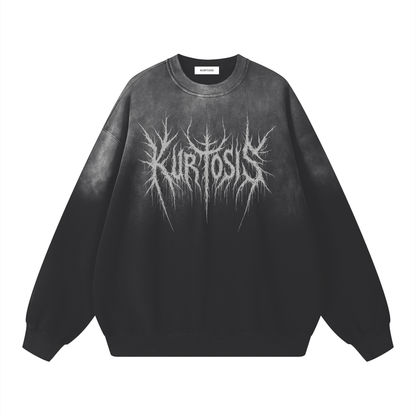 Front view of a heavyweight 350g washed black long sleeve sweatshirt featuring the Kurtosis logo in a spiky, symmetrical Black Metal aesthetic. The fabric shows a premium washed cotton texture with a loose, drop-shoulder fit.
