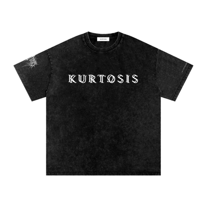 Front geometry of the KURTOSIS IN EXTREMIS EXISTERE II heavy cotton short sleeve shirt. Features a textured ashen snow wash finish with a jagged black metal style typography graphic across the chest and a loose, dropped shoulder silhouette.